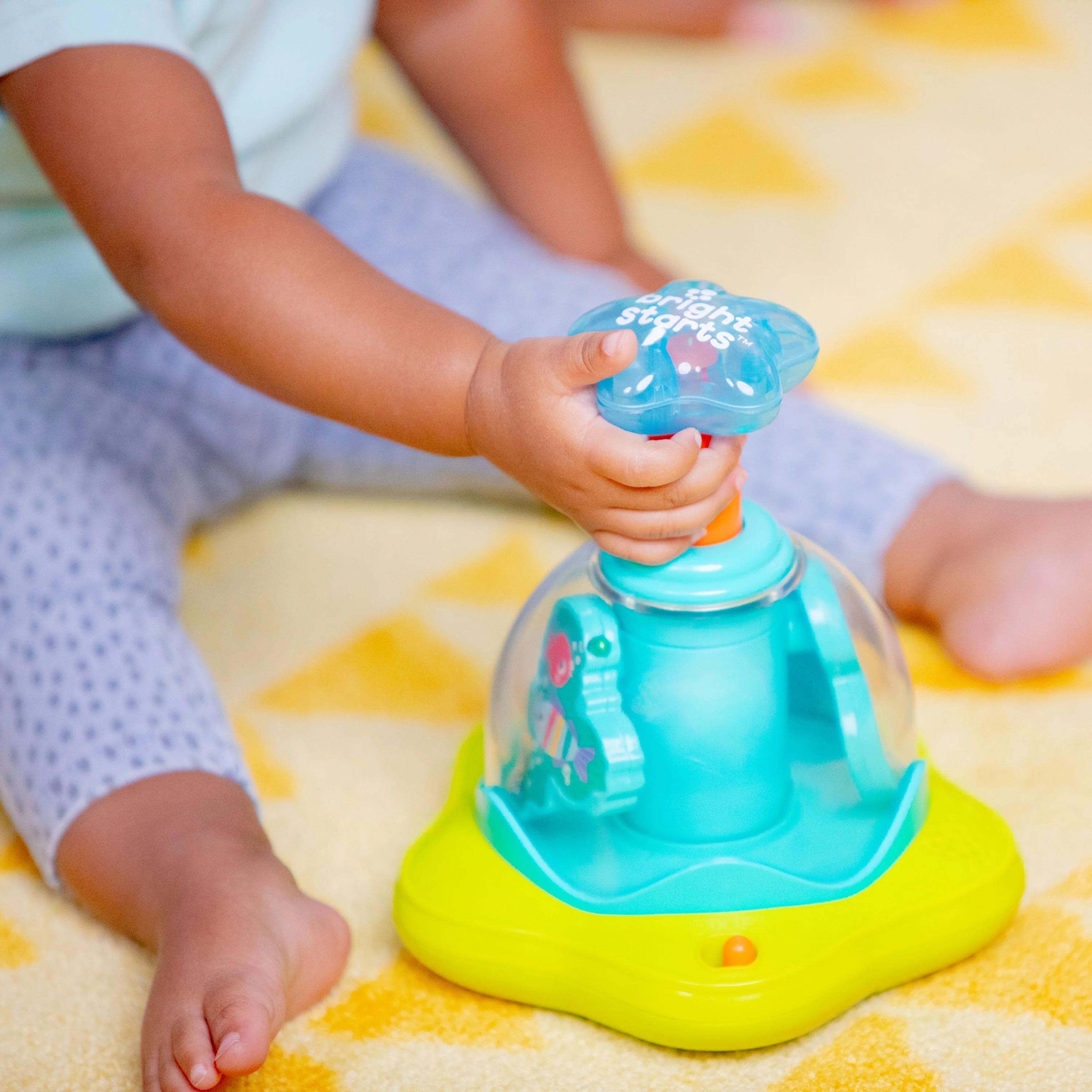 81-bright-starts-press-glow-spinner-4.webp Bright Starts Press & Glow Spinner